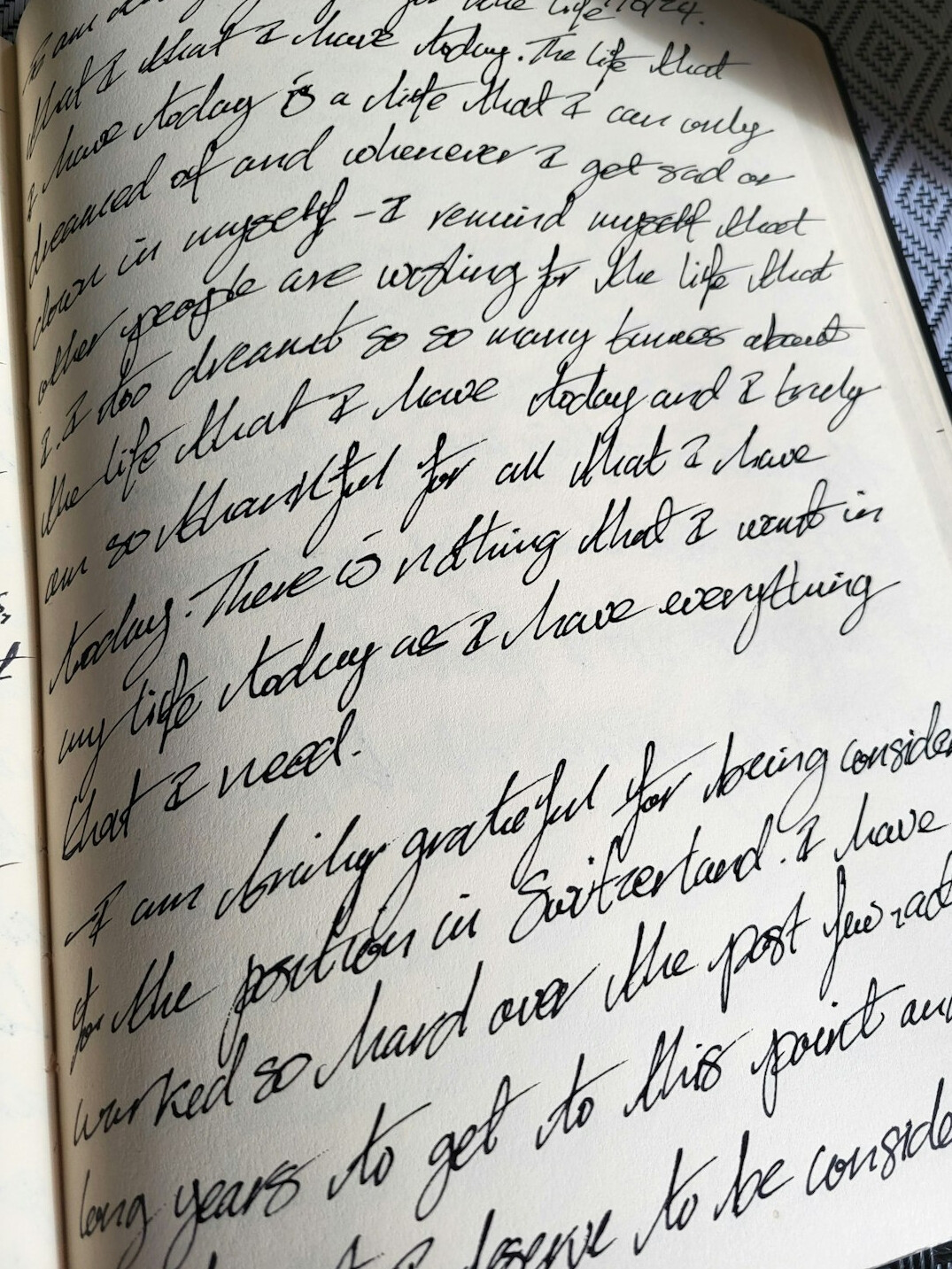 Open notebook with handwritten pages